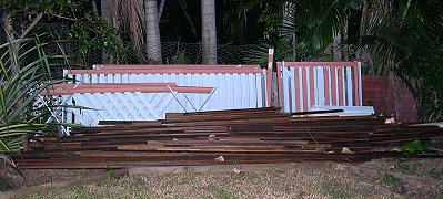 Dismantled Deck sitting in the Garden Bed