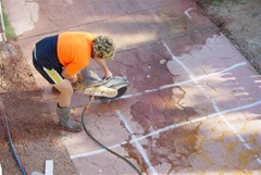 Cutting Through the Contrete on the Old Driveway