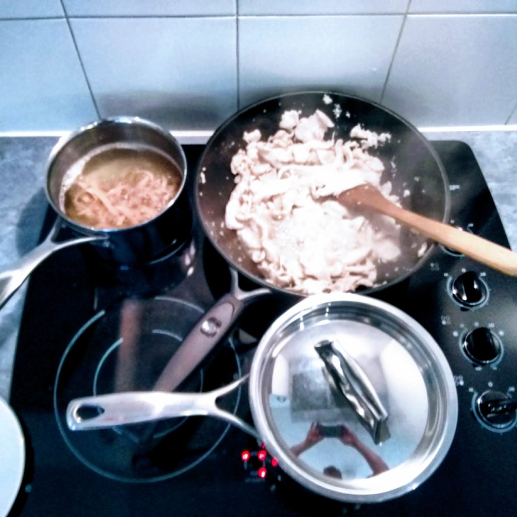 Close pots and pans on a small stove top